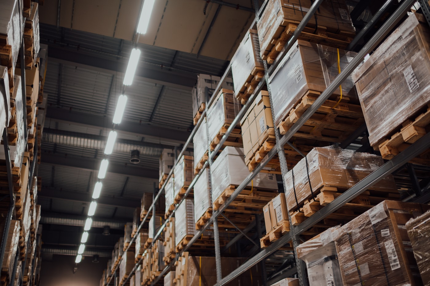 Warehouse shelving stacked with packaged inventory